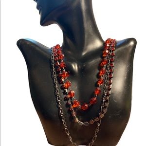 Three stranded beaded silver necklace